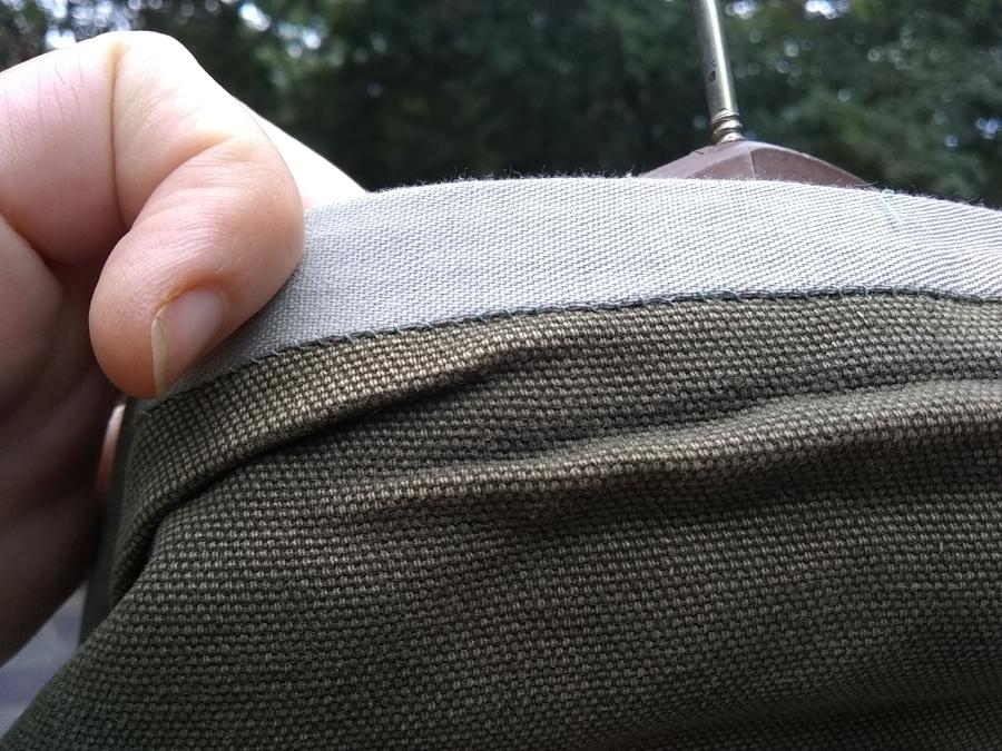 closeup back view of collar patches on Carhartt jacket