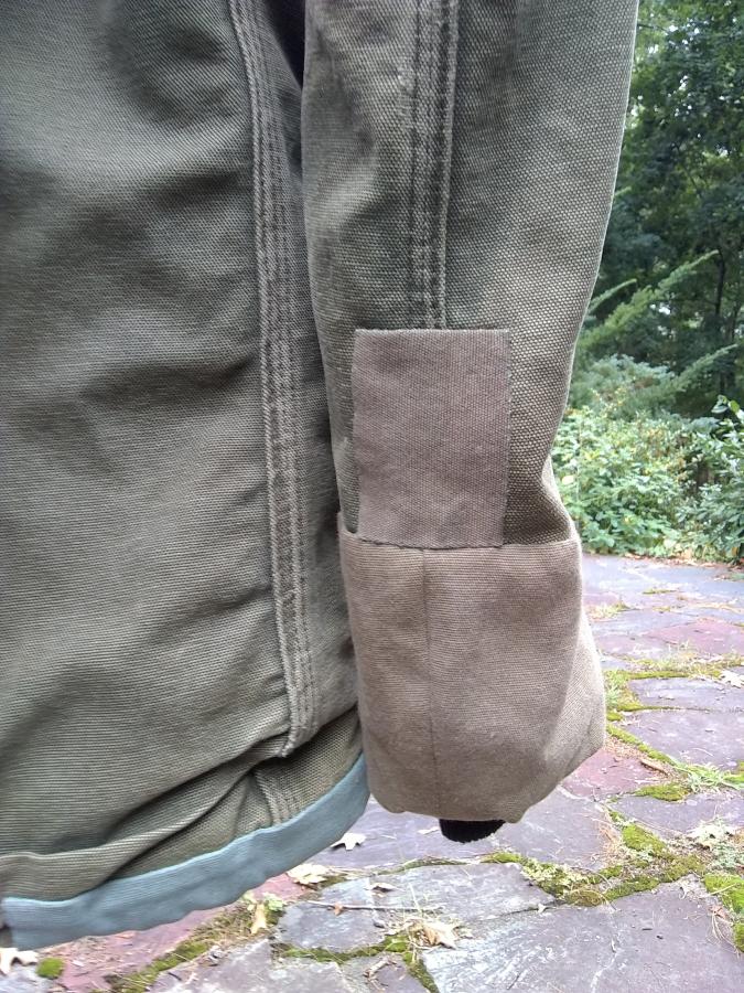 patches on the sleeve of a Carhartt jacket