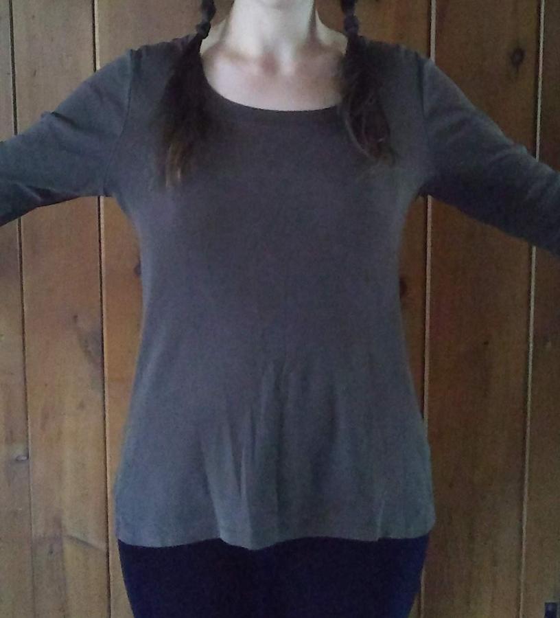 woman wearing brown shirt with slightly shaped side seams, front view