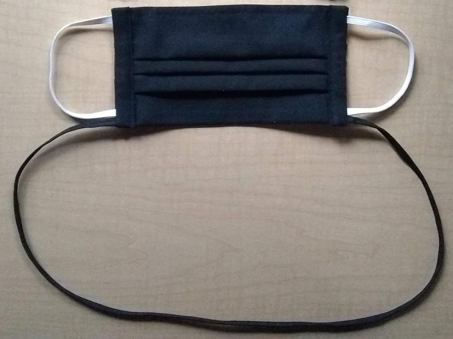black pleated mask with elastic ties and cloth neck cord
