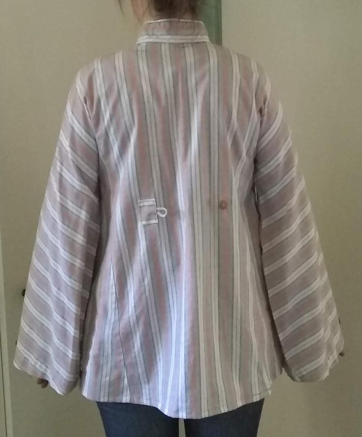 back view of shirt with tent shape and wide sleeves