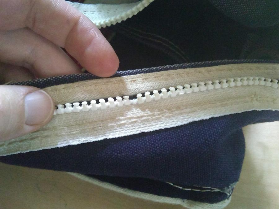 Before: some of the zipper teeth were broken