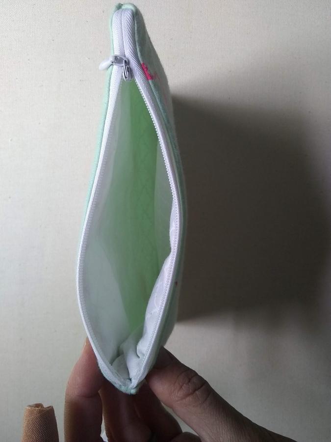 top view of wristlet, zipper open