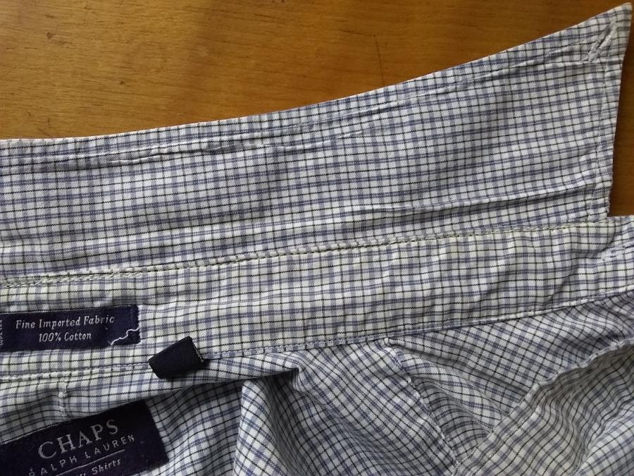 inside view of collar, popped up, with the un-worn side showing: when the collar is popped down, that un-worn side will show on the outside