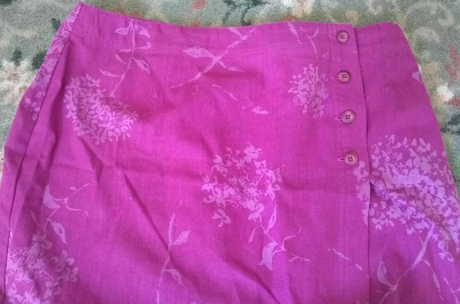 Top part of pink floral print skirt