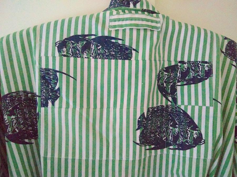 closeup of upper back of bathroom, with matching patches