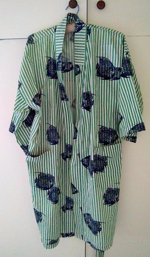 front view of patched green and white striped fish bathrobe