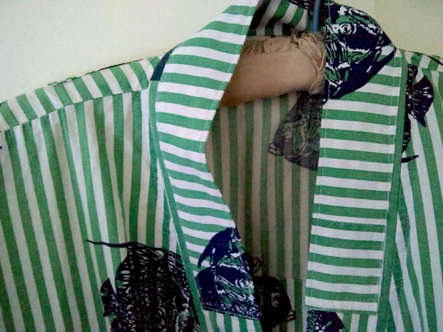 closeup of front neck of bathrobe, with almost not noticeable patches